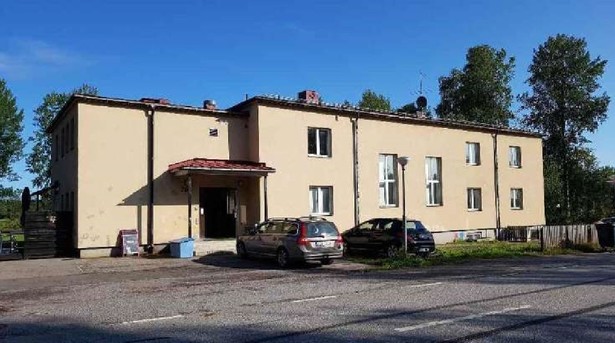 Bild för uppdrag: Fasadmålning av ett hus i Sandviken