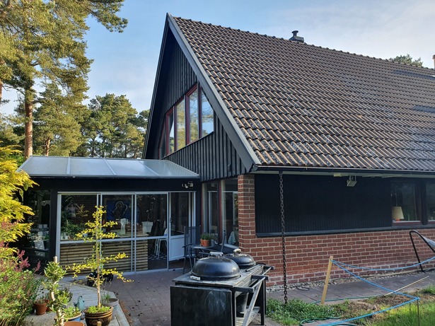 Bild för uppdrag: Fasadmålning av ett hus i Kävlinge