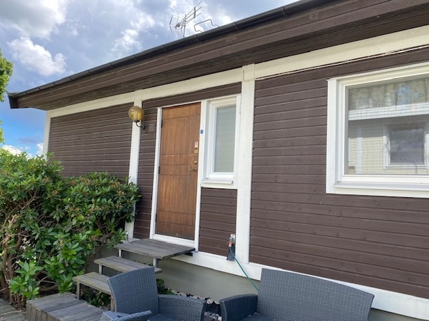 Bild för uppdrag: Fasadmålning av ett hus i Stockholm