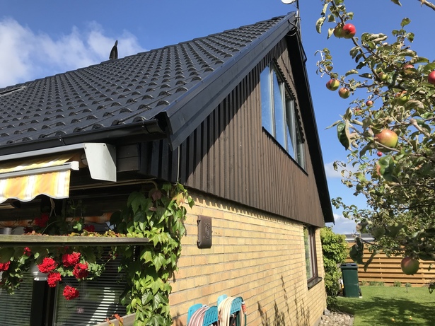 Bild för uppdrag: Fasadmålning av ett hus i Vellinge