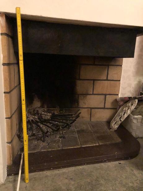 Bild för uppdrag: Installera plåtar inuti öppna spisarna i Stockholm
